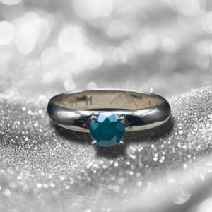 GIA Certified 0.66 carat enhanced blue diamond ring in handcrafted 14k ultra white gold with a half-round band from Silver Mountain Metals.