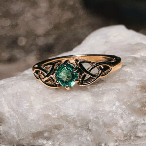 GIA Certified Panjshir Emerald ring on a handcrafted 14k yellow gold Celtic Knot band